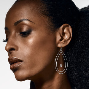Wearing multiple on sale hoop earrings